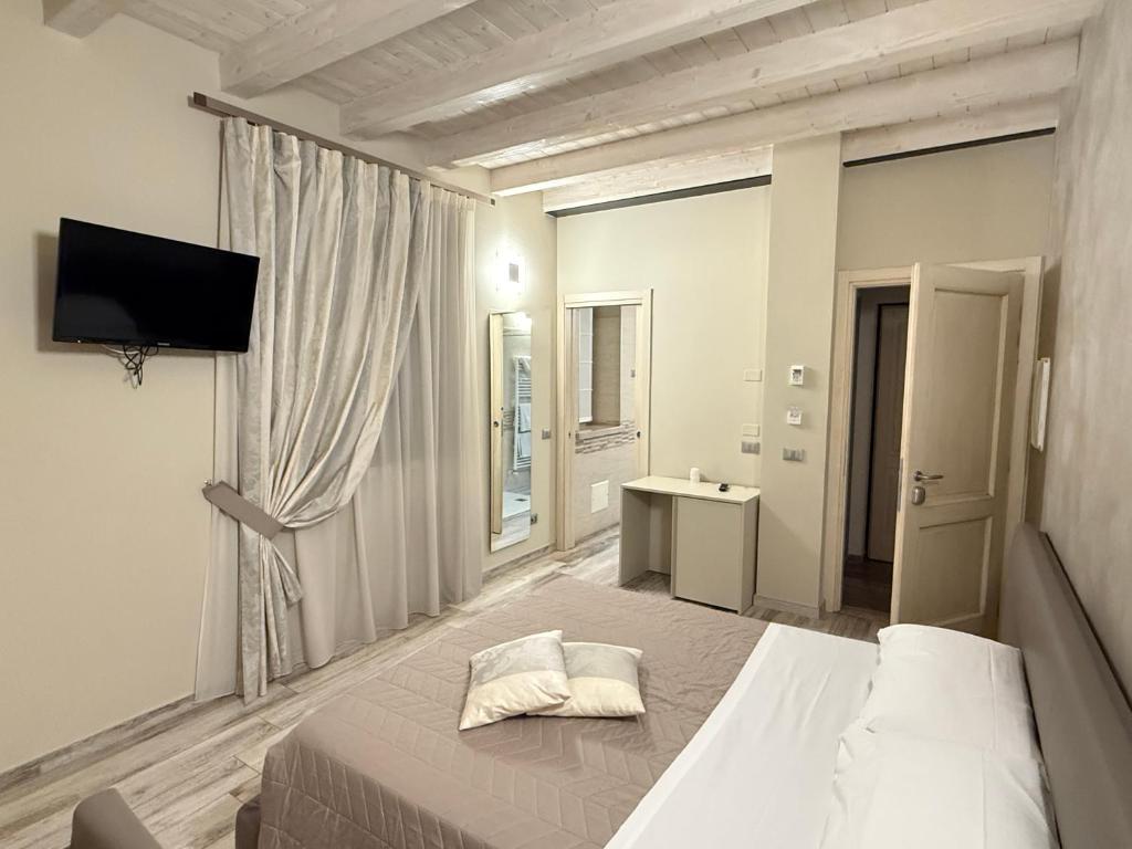 Katil atau katil-katil dalam bilik di Hotel La Valle