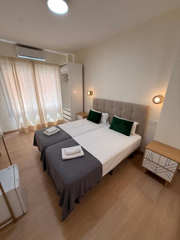 Ένα ή περισσότερα κρεβάτια σε δωμάτιο στο Ola Málaga