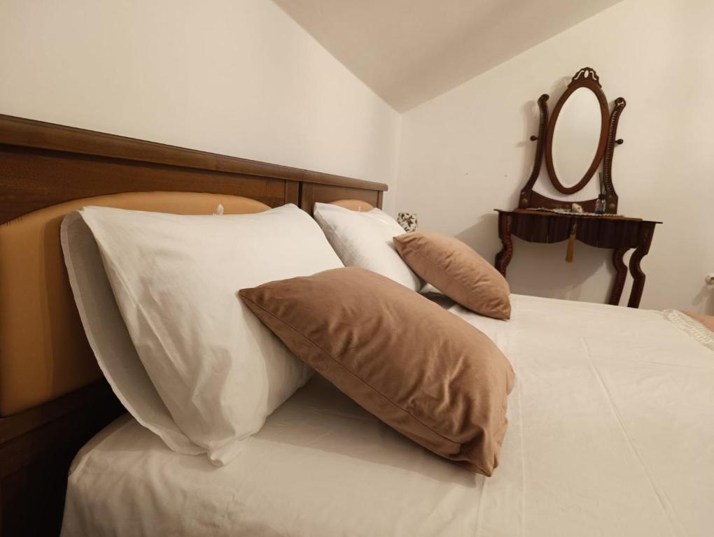 Postel nebo postele na pokoji v ubytování Domus MiTo