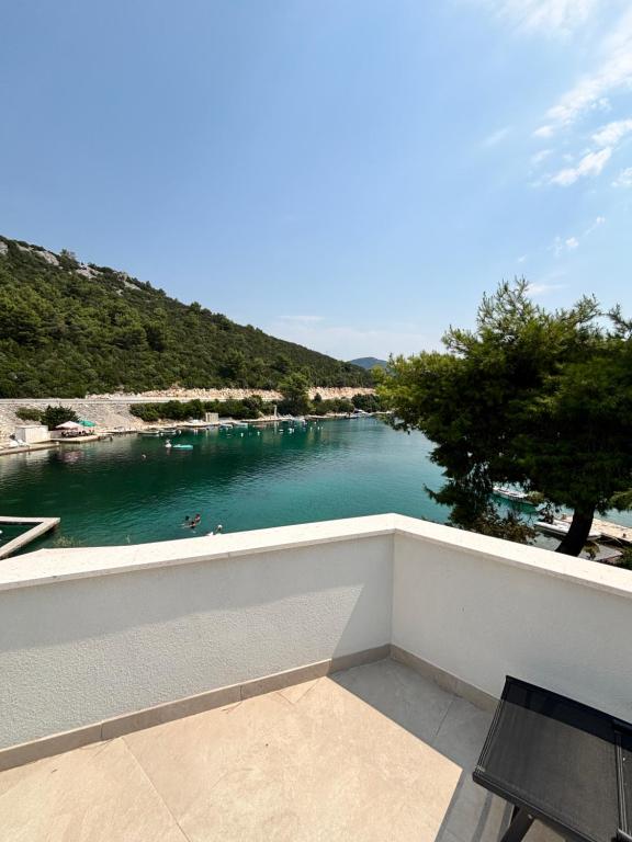 a view of a river from a balcony at Apartment Marevic in Klek