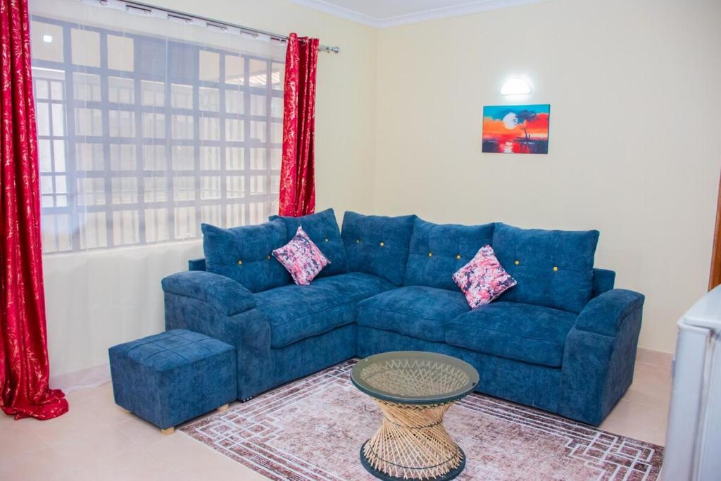 Χώρος καθιστικού στο Cozy 1 bedroom getaway in section 58, lake Nakuru views