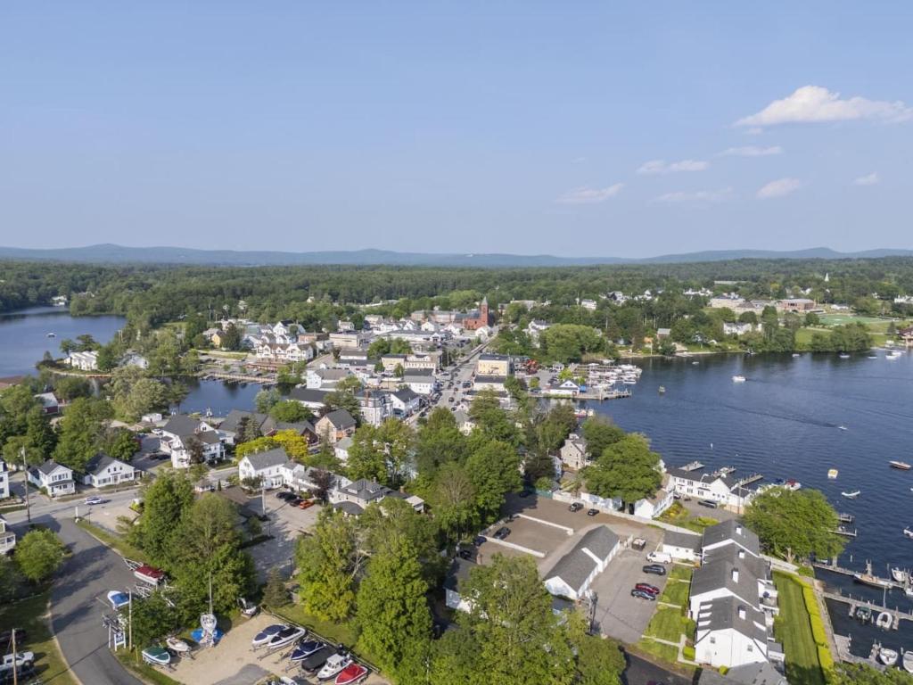 an aerial view of a town on the water at Spacious Luxe Condo in Historic Downtown Wolfeboro in Wolfeboro