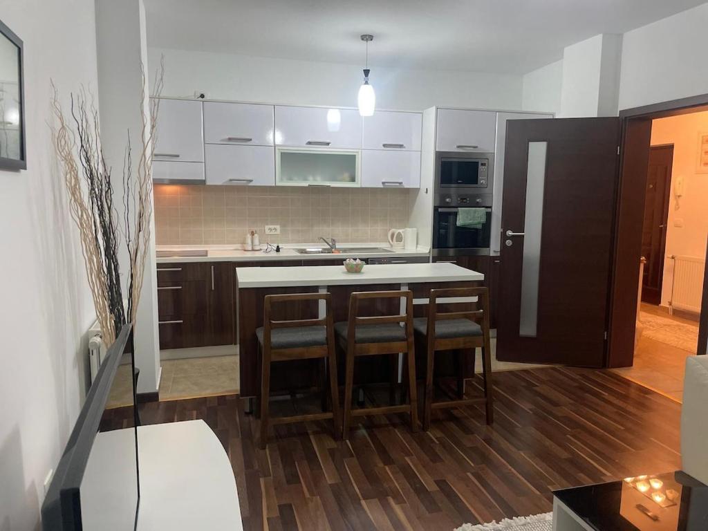 Η κουζίνα ή μικρή κουζίνα στο Apartment Center