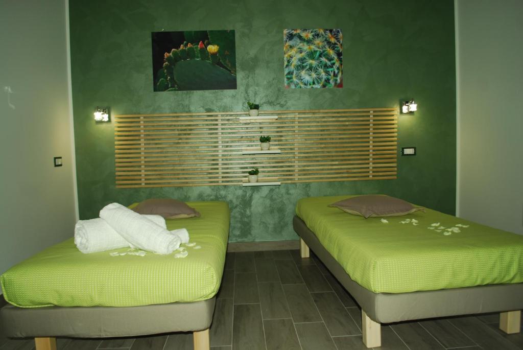 Postel nebo postele na pokoji v ubytování B&B Aurora
