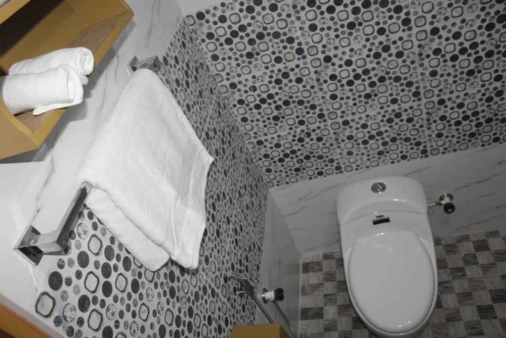 Koupelna v ubytování Marari Edens