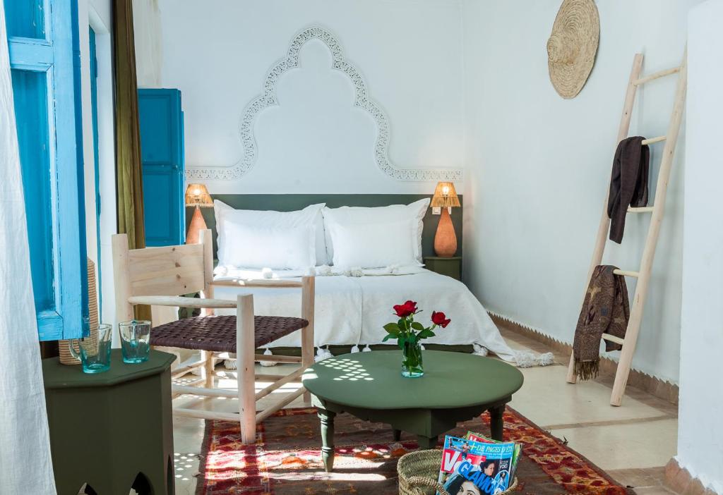 Postel nebo postele na pokoji v ubytování Riad Chamali
