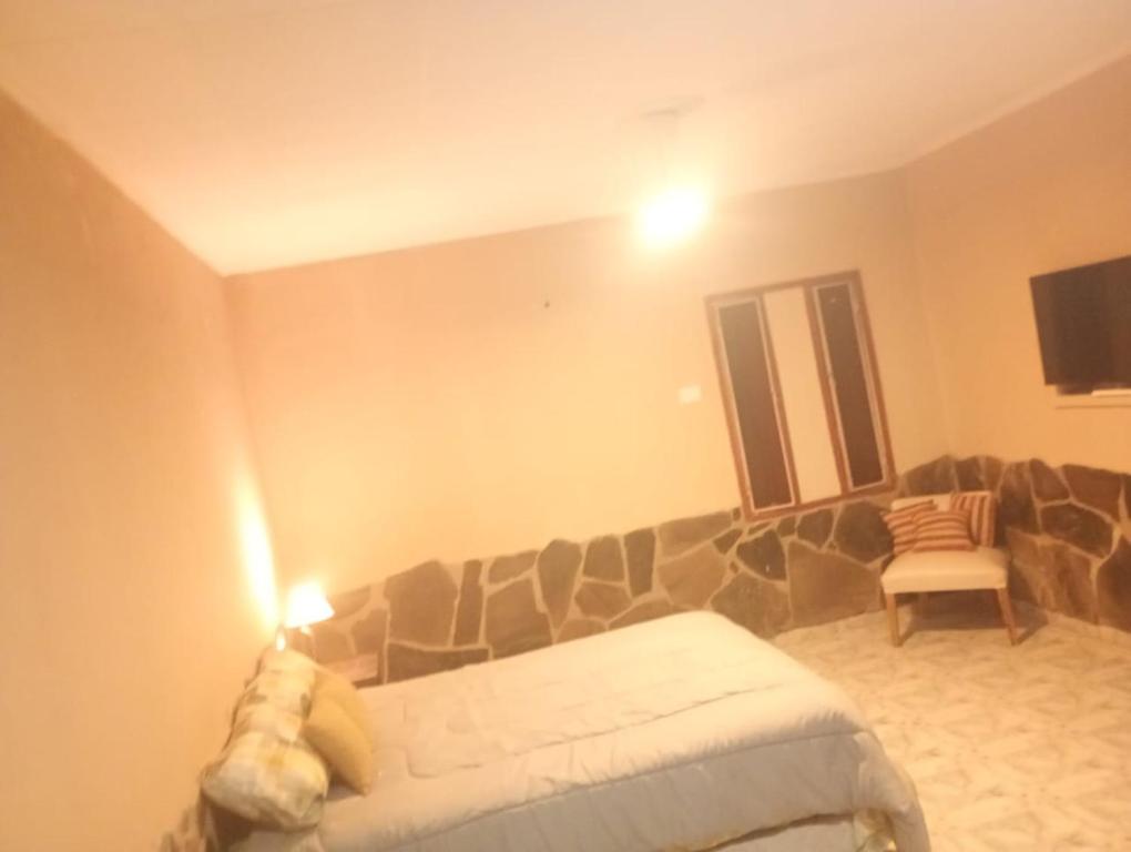 Ένα ή περισσότερα κρεβάτια σε δωμάτιο στο Mí Casa D2