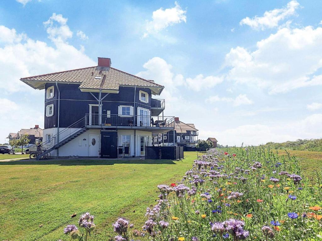 Κήπος έξω από το 4 star holiday home in Bogense