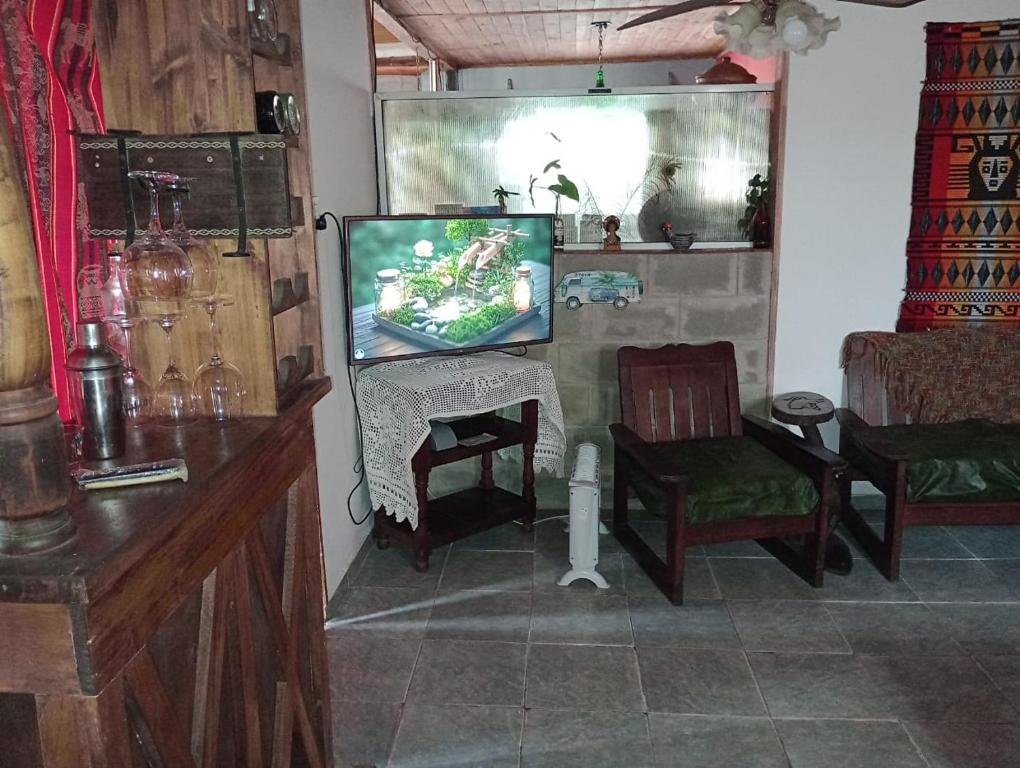 TV a/nebo společenská místnost v ubytování Casa de campo La Mary