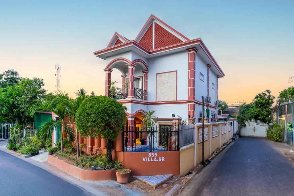 a house in the middle of a street at 855 Villa S R in Siem Reap