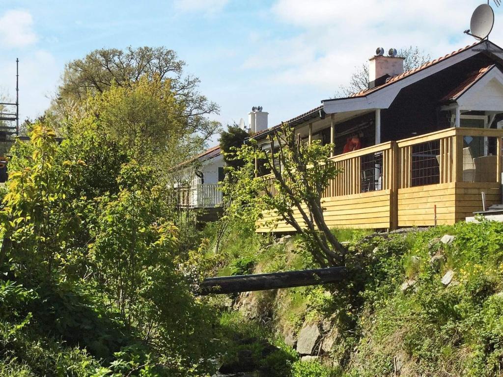 a house on the side of a hill at 6 person holiday home in SÖLVESBORG in Björkenäs