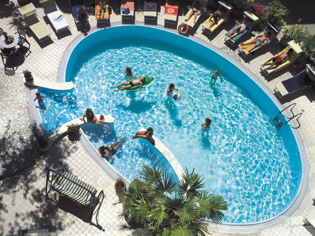an overhead view of people swimming in a pool at Hotel Acquamarina in Bellaria-Igea Marina