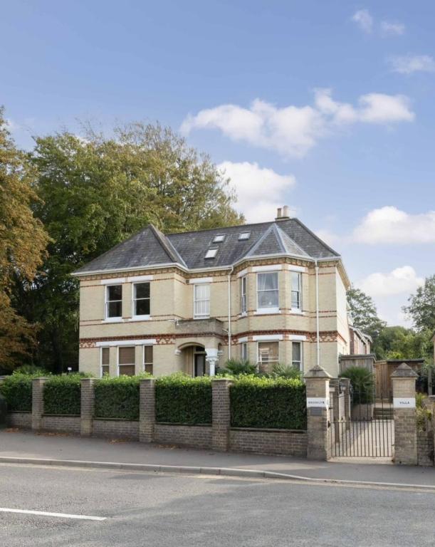 a house on the side of a street at The Residence in Norwich