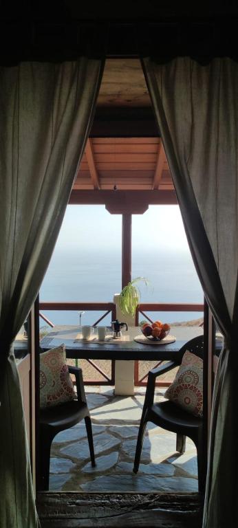 a view from a tent with a table and chairs at "VILLA SERVANDA" - Casa Canaria construida a PRINCIPIOS DEL SIGLO XIX in Puntagorda