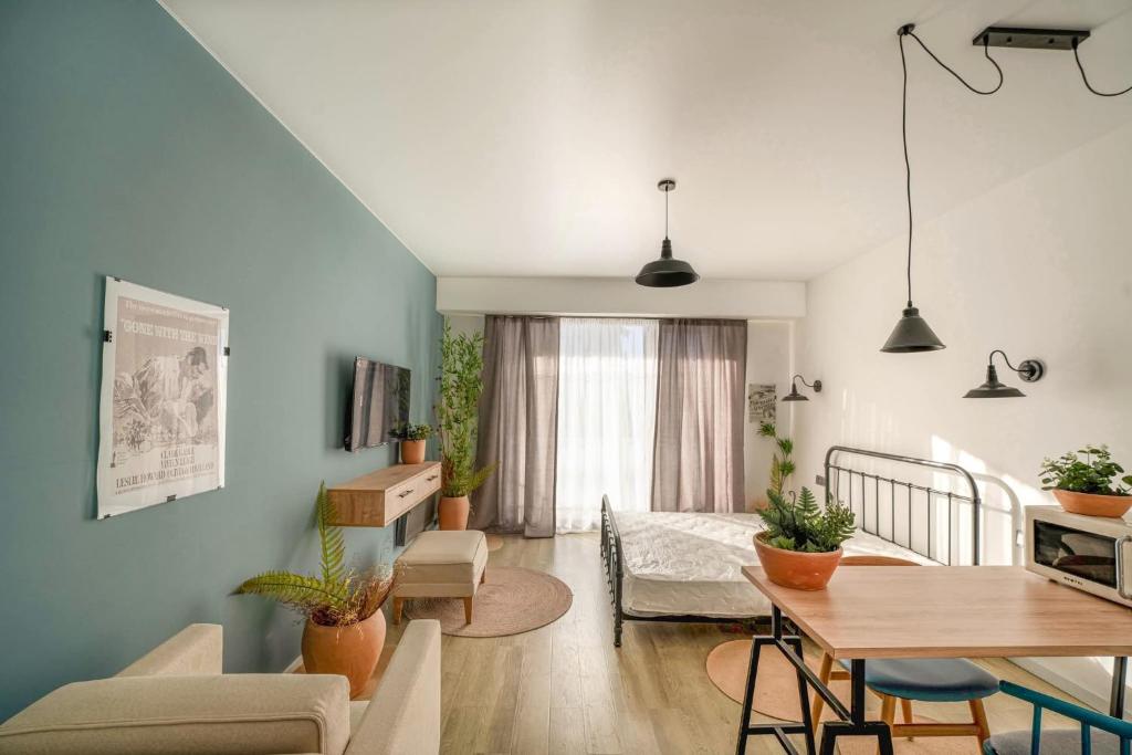 Postel nebo postele na pokoji v ubytování Raimond Residence - 202