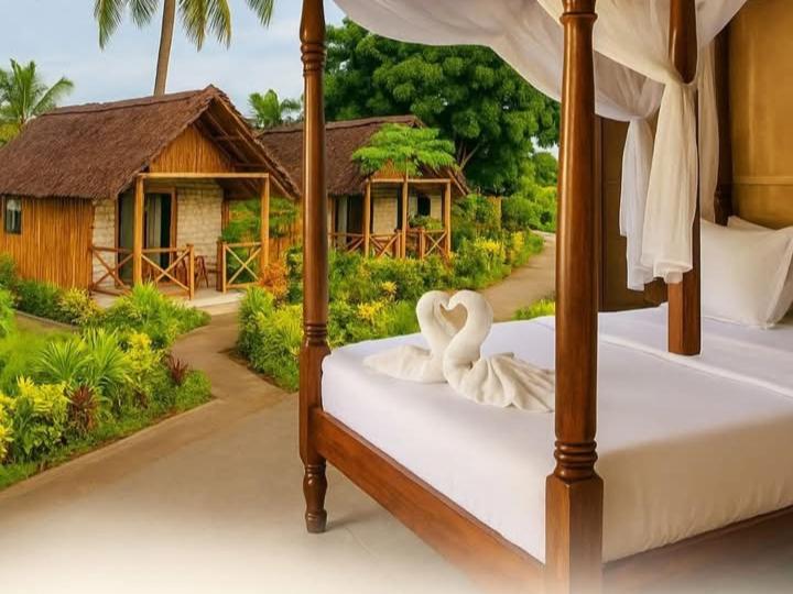 Postel nebo postele na pokoji v ubytování Mangrove Village Resort