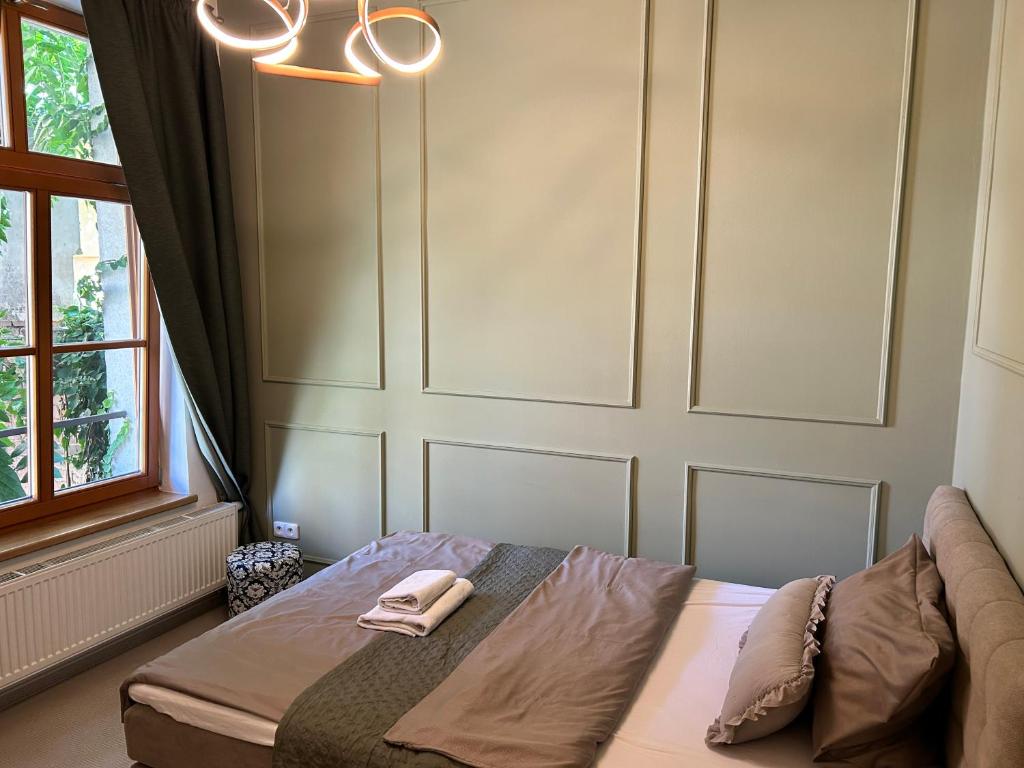 Giường trong phòng chung tại Pension U Jakuba