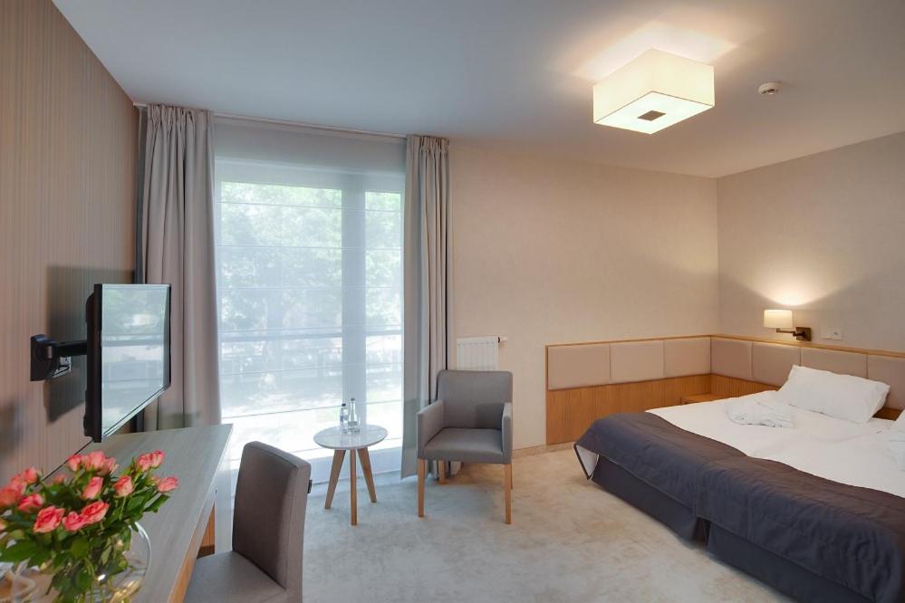 Posteľ alebo postele v izbe v ubytovaní Eva Park Life & Spa