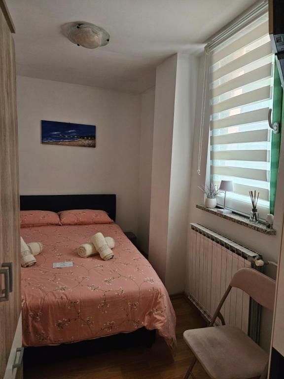 Ένα ή περισσότερα κρεβάτια σε δωμάτιο στο Apartment Center Koper
