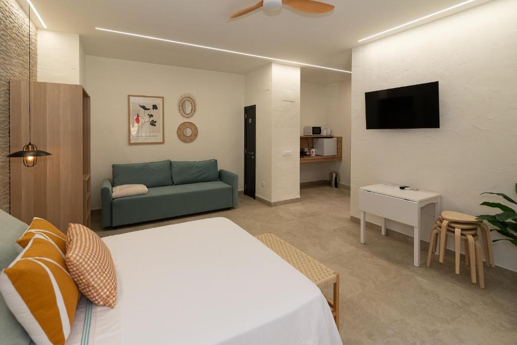 Televisyen dan/atau pusat hiburan di Xaloc Habitaciones