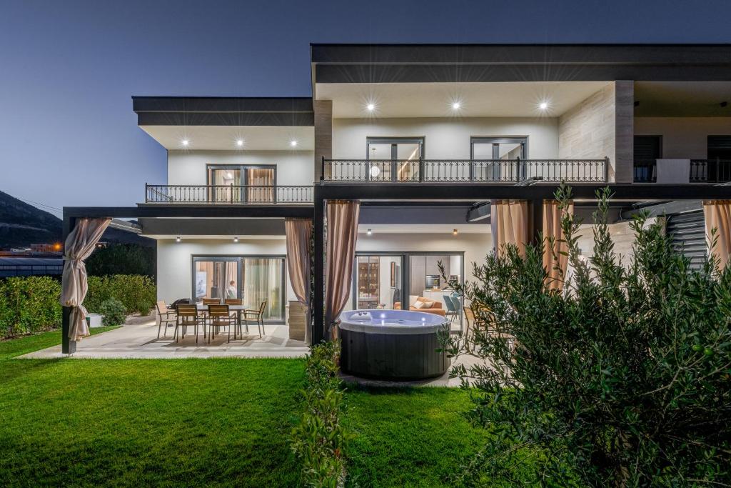 Thumbnail for Green Luxury Villa Rentals With Outdoor Hot Tubs And Wine Cellar