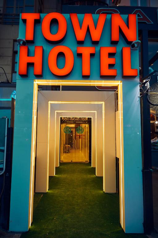 a view of a walkway into a show house at Town Hotel- Hurghada in Hurghada