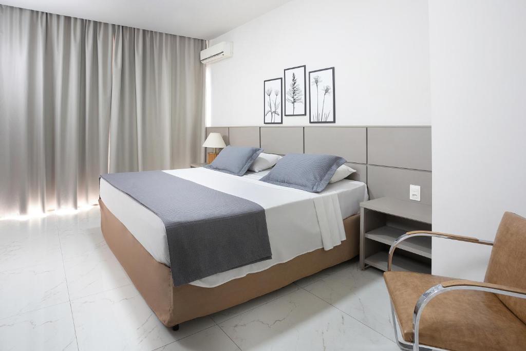 Кровать или кровати в номере Hotel Nacional Inn Belo Horizonte