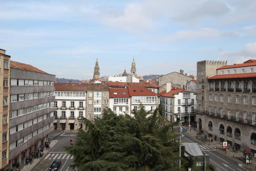 Výhľad na mesto Santiago de Compostela alebo výhľad na mesto priamo z penziónu