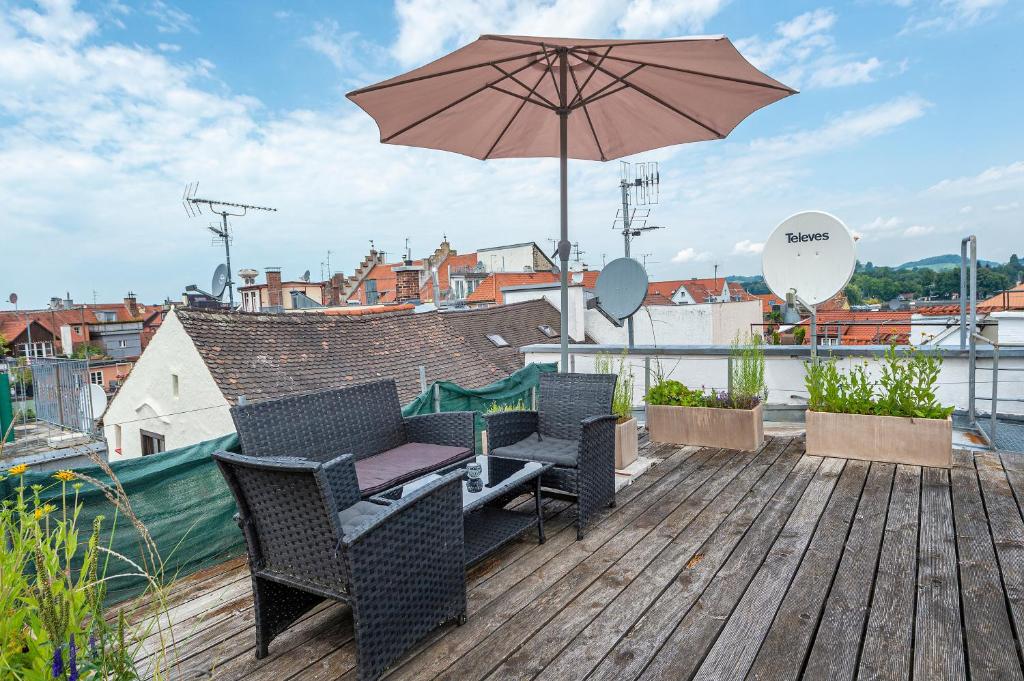 Balkón nebo terasa v ubytování Ferienwohnungen Spiegel - Fewo mit Dachterrasse Mediterran 3