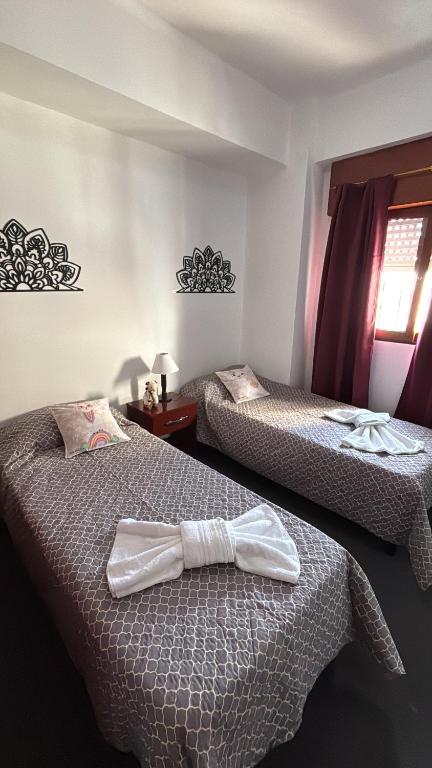 - 2 lits dans une chambre d'hôtel dotée d'une cravate dans l'établissement Victoria, à Salta