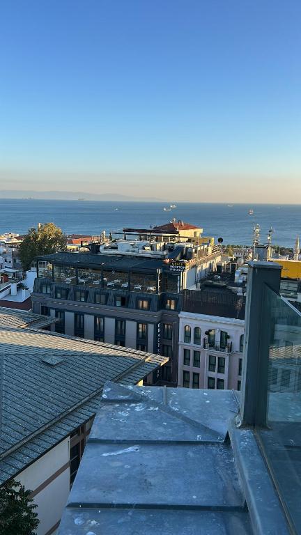 a view of a city with buildings and the ocean at Oldsophia hotels in Istanbul