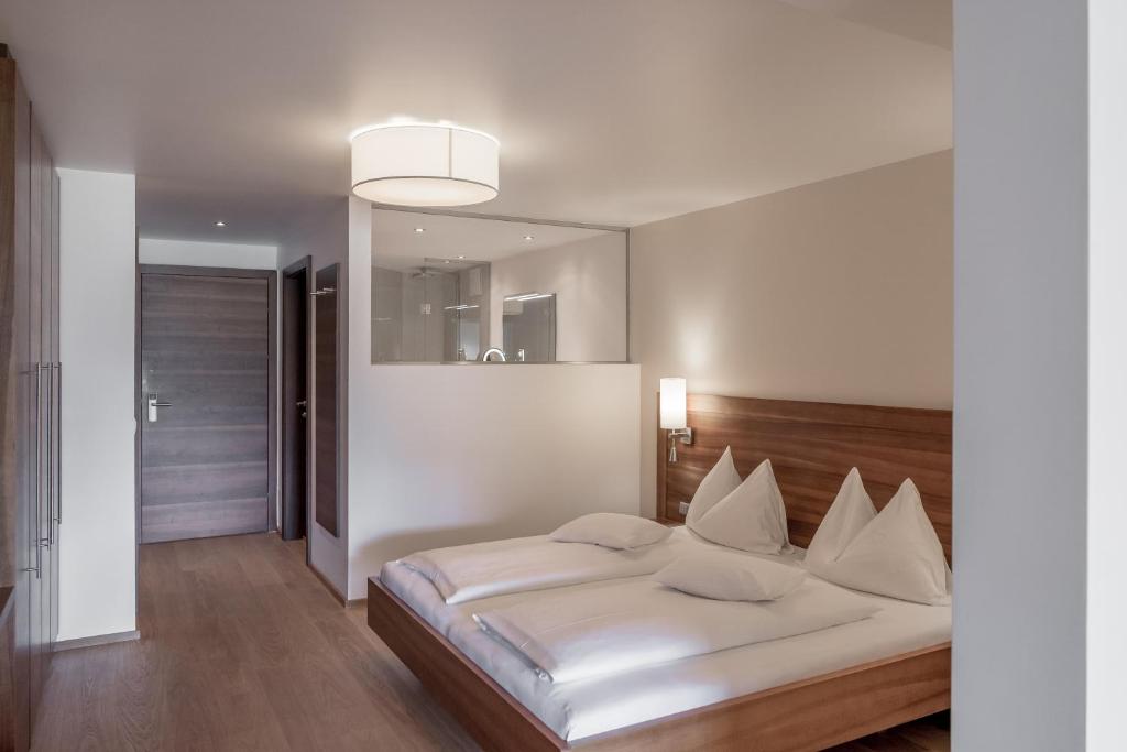 Voodi või voodid majutusasutuse Seehotel Restaurant Lackner toas