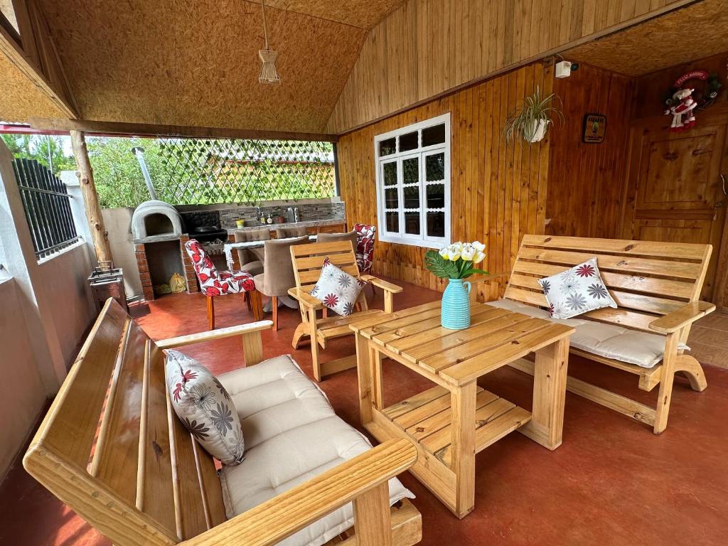 Posezení v ubytování La posada del minero Oxapampa