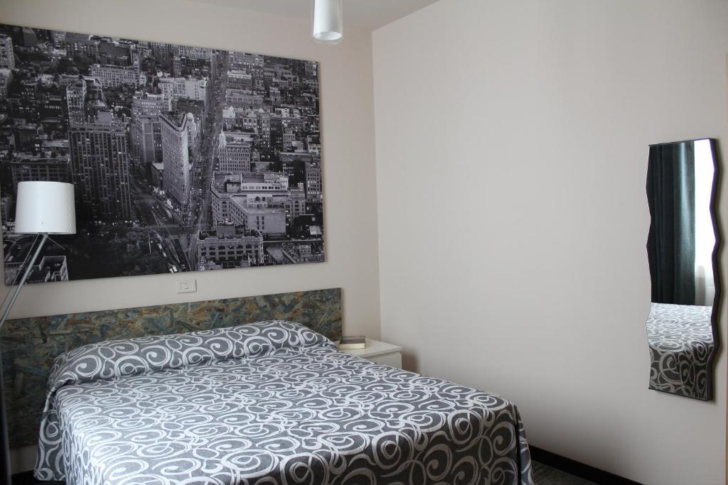 Postel nebo postele na pokoji v ubytování Bigarò