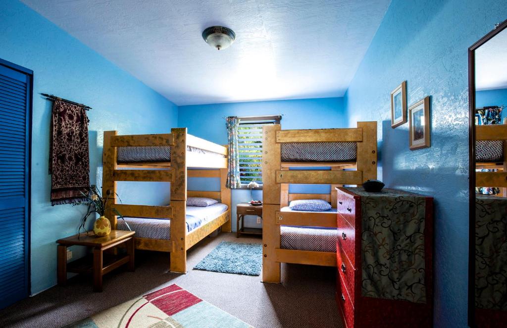 Postel nebo postele na pokoji v ubytování Kalani Hawaii Private Lodging