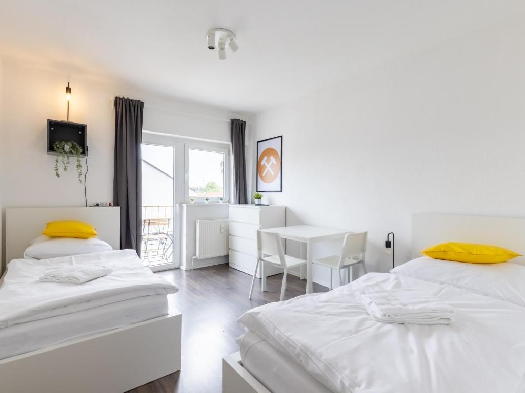 Ένα ή περισσότερα κρεβάτια σε δωμάτιο στο Nice Apartment Castrop-Rauxel