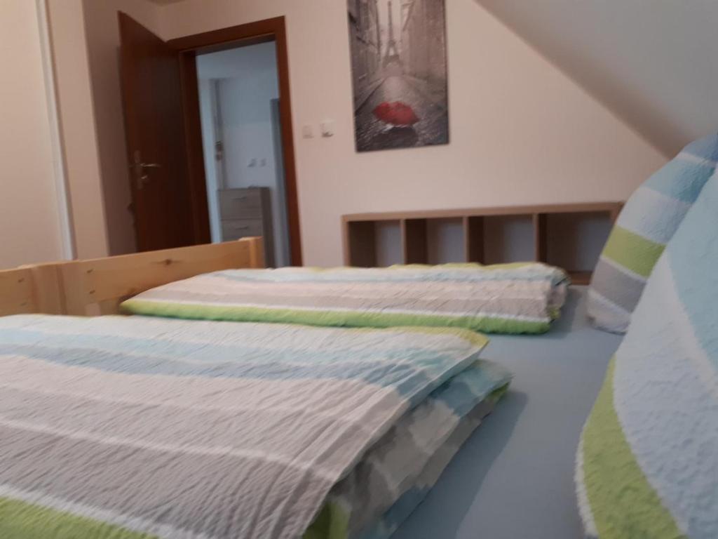 Postel nebo postele na pokoji v ubytování Monteurwohnung mit 3 Schlafzimmer Haus 9
