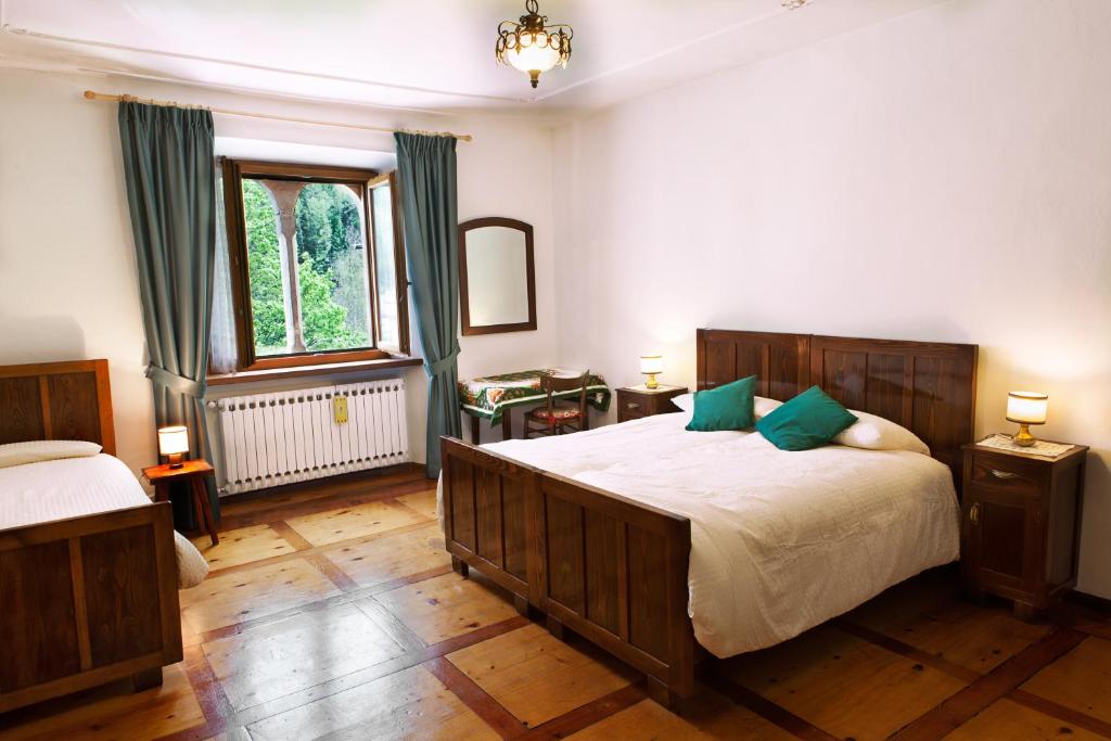 Postel nebo postele na pokoji v ubytování B&B Cà dei Baroni