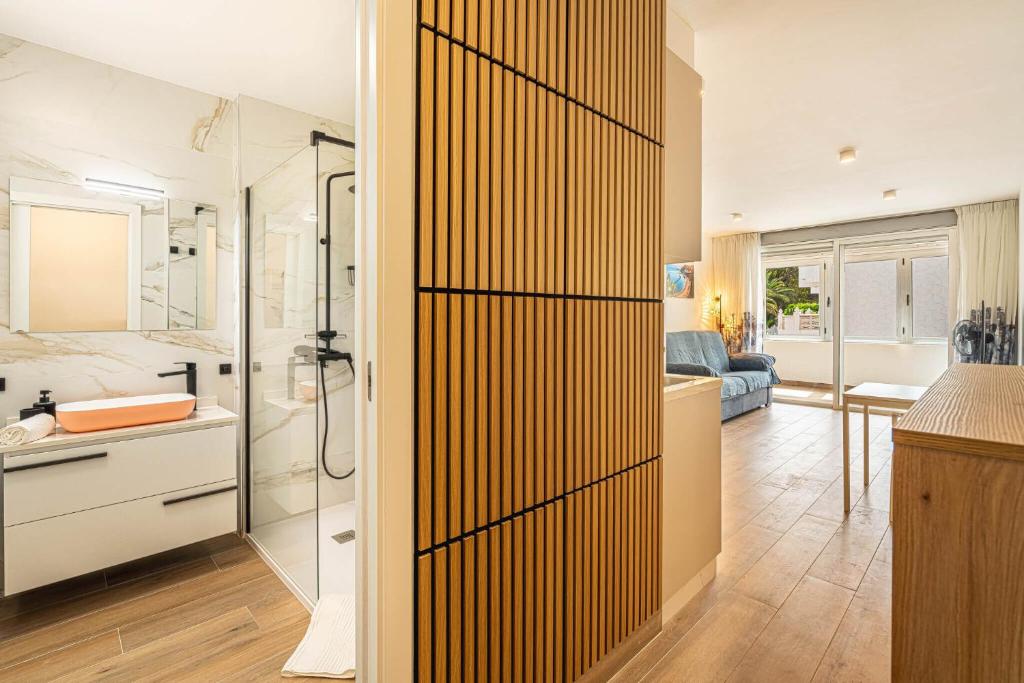 a bathroom with a shower and a toilet in a room at Panarea Chaparal in Costa Del Silencio