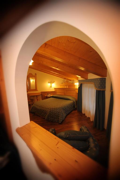 Postel nebo postele na pokoji v ubytování Hotel Mountain Resort