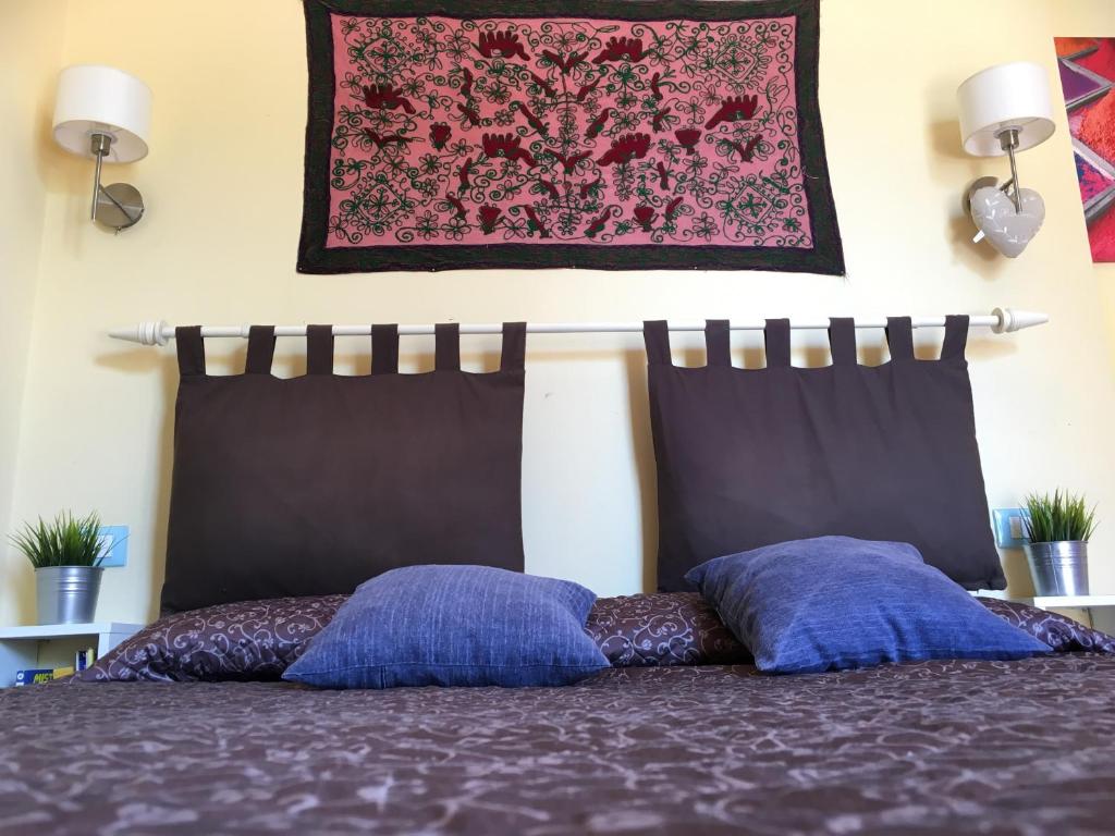Postel nebo postele na pokoji v ubytování Mondello Room