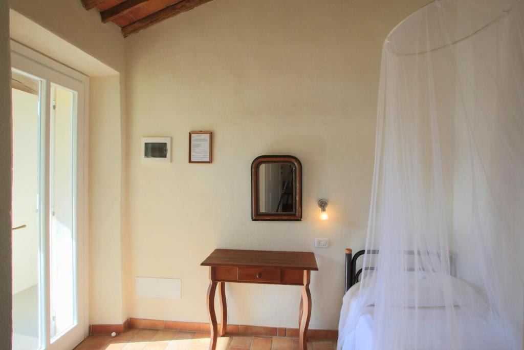Postel nebo postele na pokoji v ubytování Hotel Santo Stefano