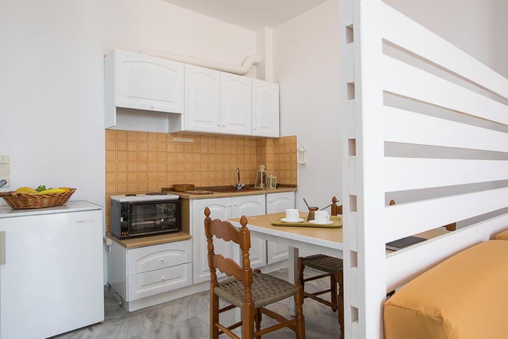 Kuchyň nebo kuchyňský kout v ubytování Castello Bianco Aparthotel