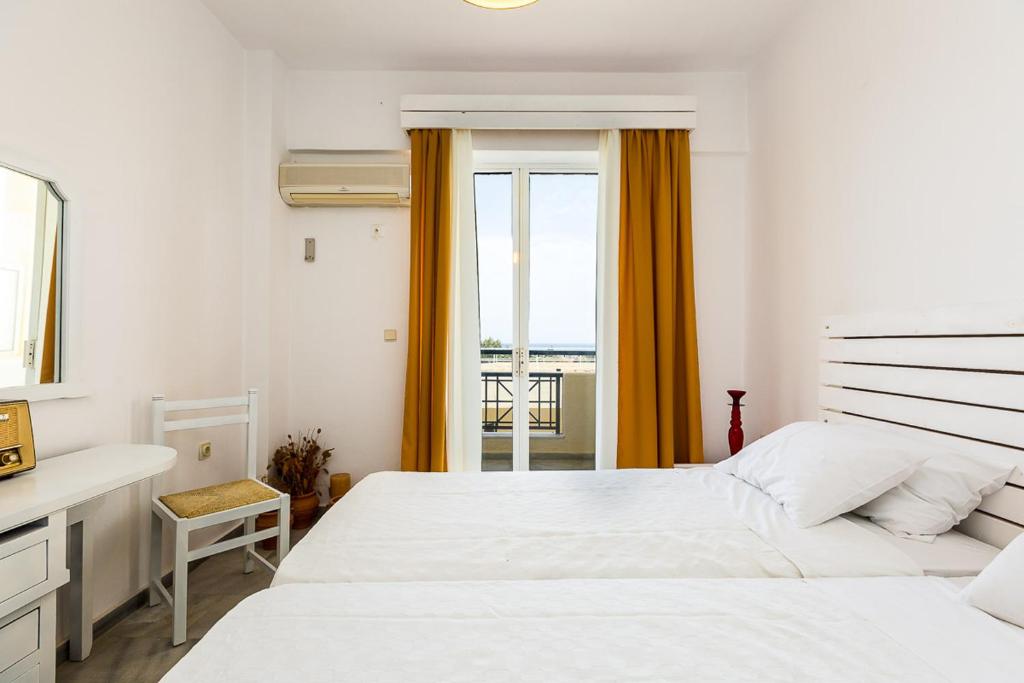 Postel nebo postele na pokoji v ubytování Castello Bianco Aparthotel