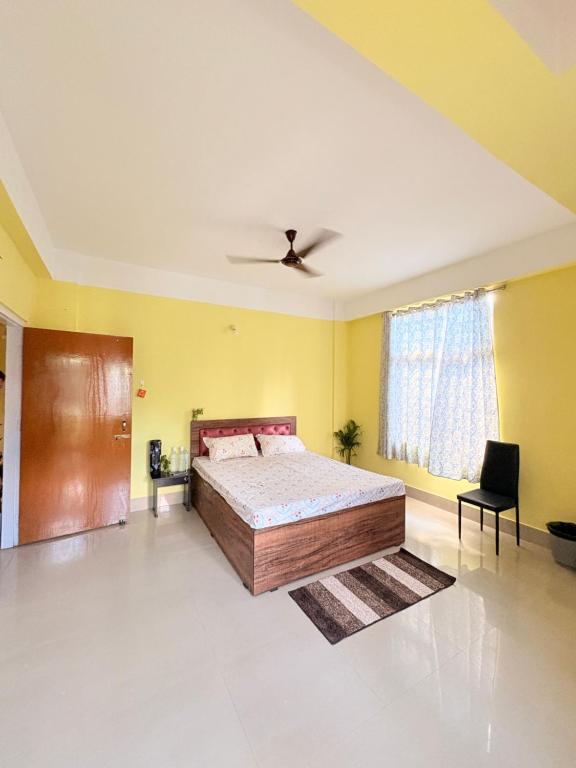 Ένα ή περισσότερα κρεβάτια σε δωμάτιο στο Elegant homestay