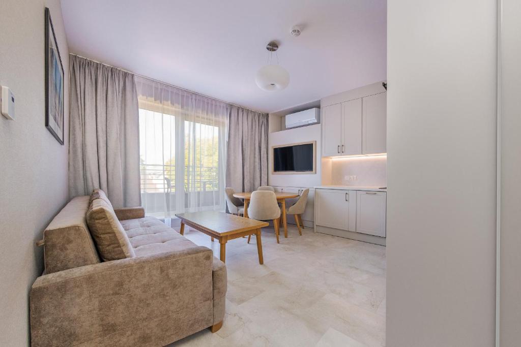 TV a/nebo společenská místnost v ubytování Orłowski Zakątek