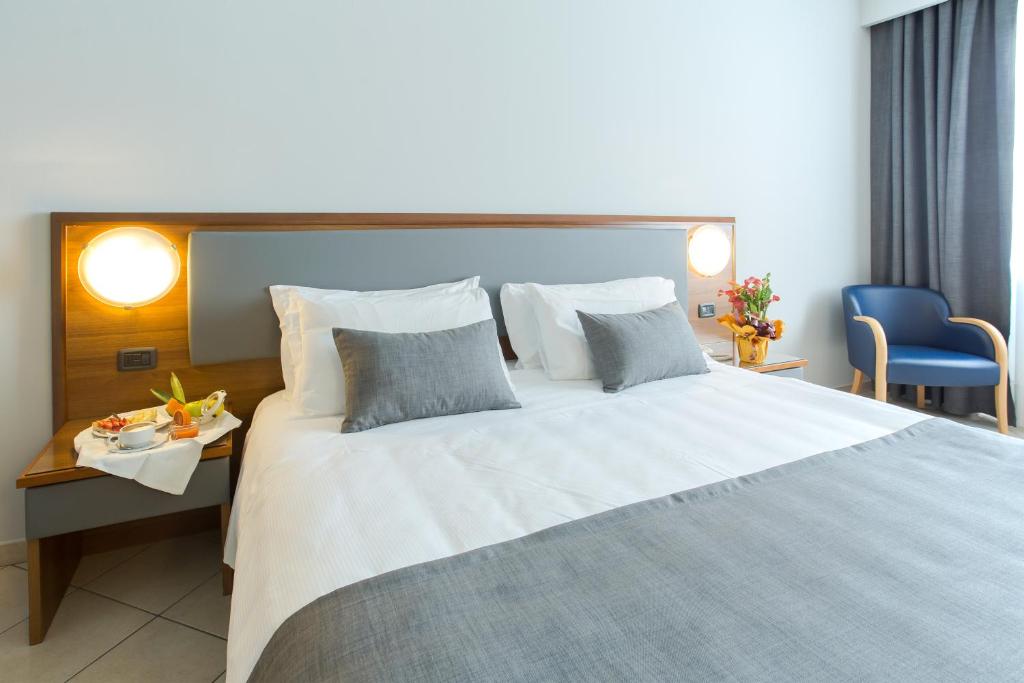 Łóżko lub łóżka w pokoju w obiekcie Blu Hotel - Sure Hotel Collection by Best Western