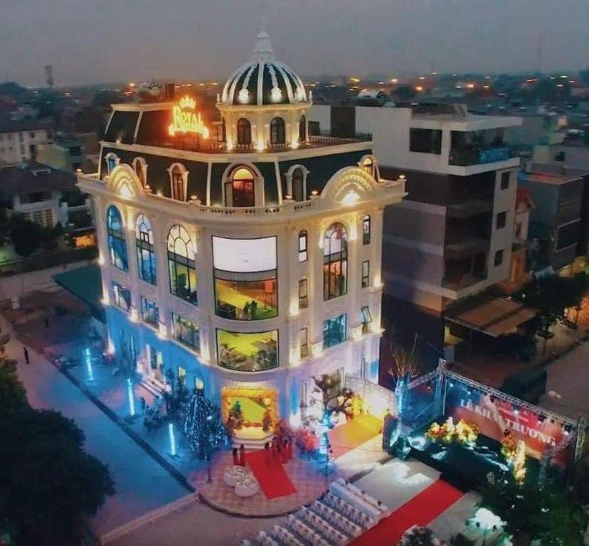 an aerial view of a building at night at Royal Homestay - Royal Center in Móng Cái