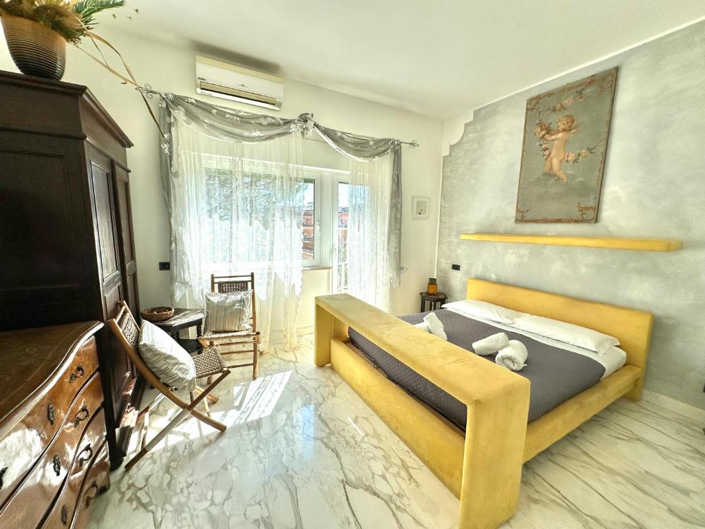 a bedroom with a bed and a tv in it at Penthouse Luxe - Rome in Rome