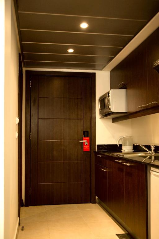Kuchyň nebo kuchyňský kout v ubytování Santona Residence